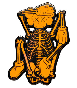 KAWS x NGV 'Skeleton' (orange) Enamel Pin